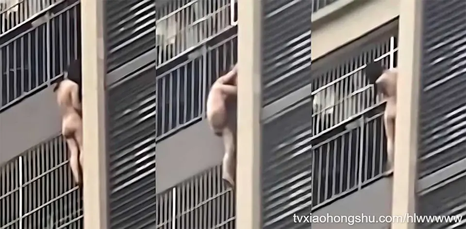 女子洗澡突发火灾 全裸徒手爬栏杆高空逃生 高楼浓烟滚滚 现场惊心动魄生死一线！